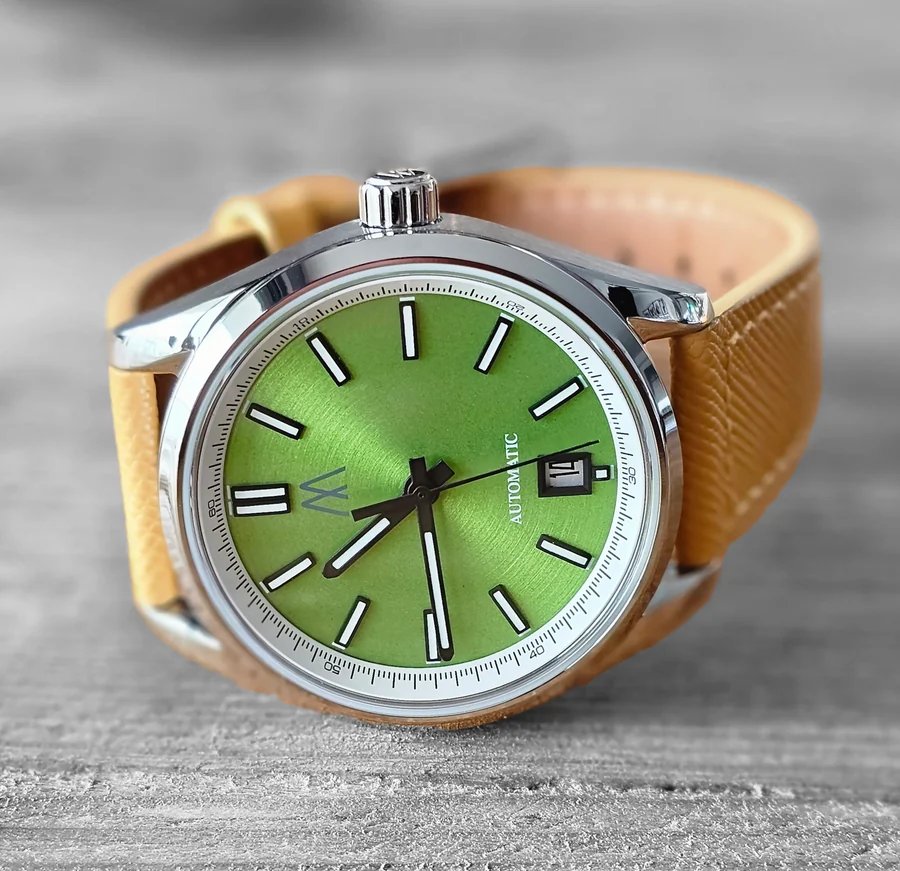 Official Meshberg image of the 37 Automatic Pistachio Dream with a pistachio-green dial on a tan leather strap.