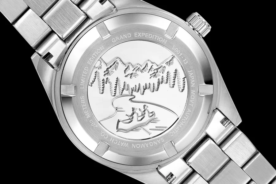 Official caseback photo of the Sangamon Grand Expedition Black showing the engraved river scene and 200 meters marking.