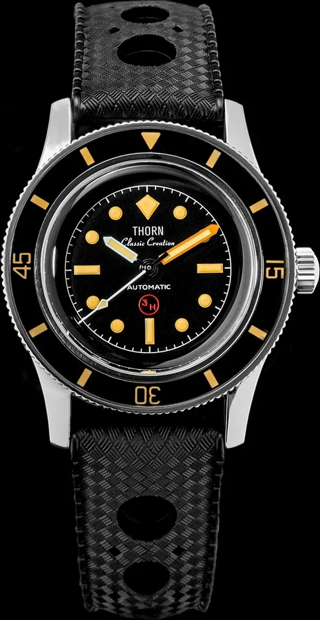 Official THORN image of the T008 38 mm titanium 50-fathoms-style diver with a black dial and black rubber strap.